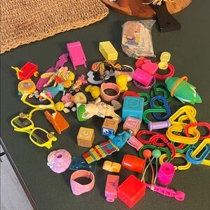 Vintage multi items Polly pockets, Mc Donald toys, cookie monster and more